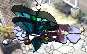 Butterfly on a Blooming Branch Suncatcher