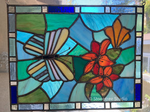 Blue, green, red, orange stained glass panel