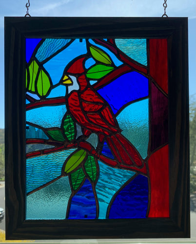 red and blue cardinal stained glass